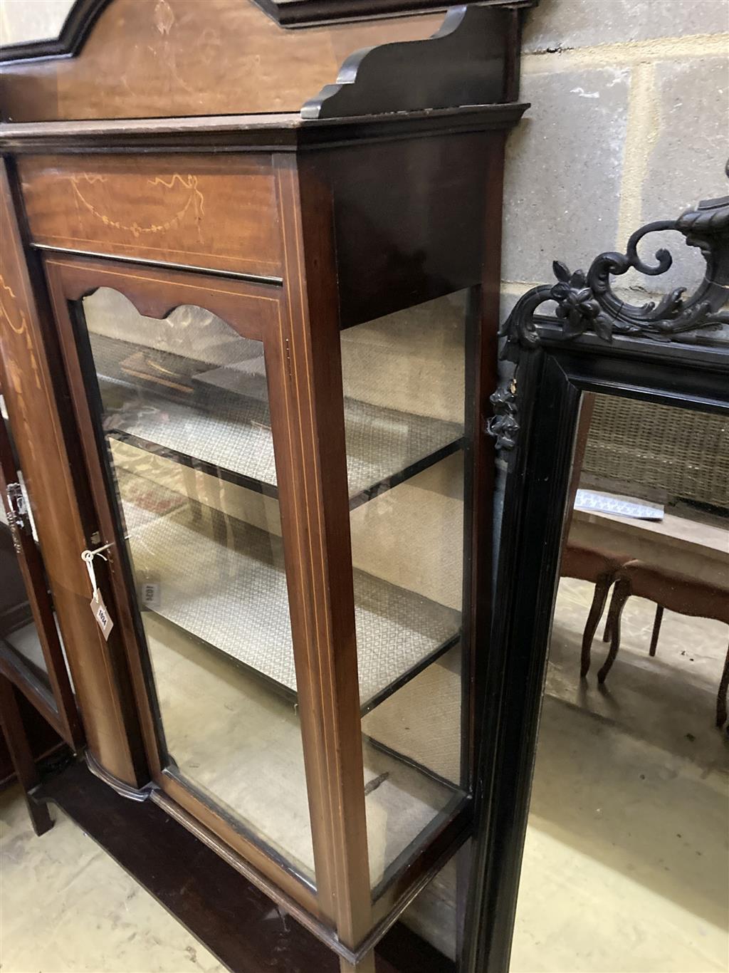 An Edwardian inlaid mahogany display cabinet, width 120cm, depth 35cm, height 175cm